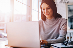 photo of a woman reading online