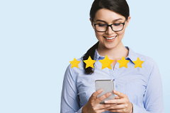 photo of a young woman looking at customer reviews on a smartphone