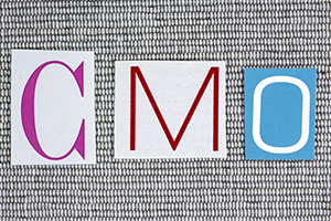 image of letters spelling out c-m-o
