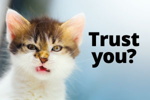 photo of a snarling cat with the text "Trust you?"
